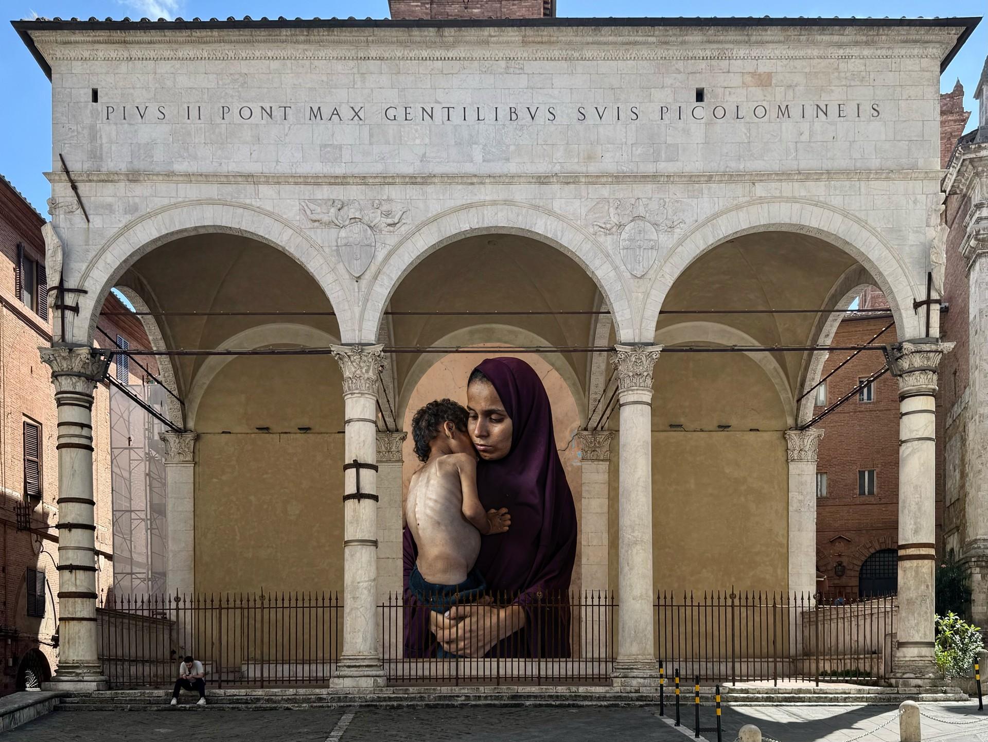 EMBRACING HUMANITY - Dialogo tra immagine e architettura