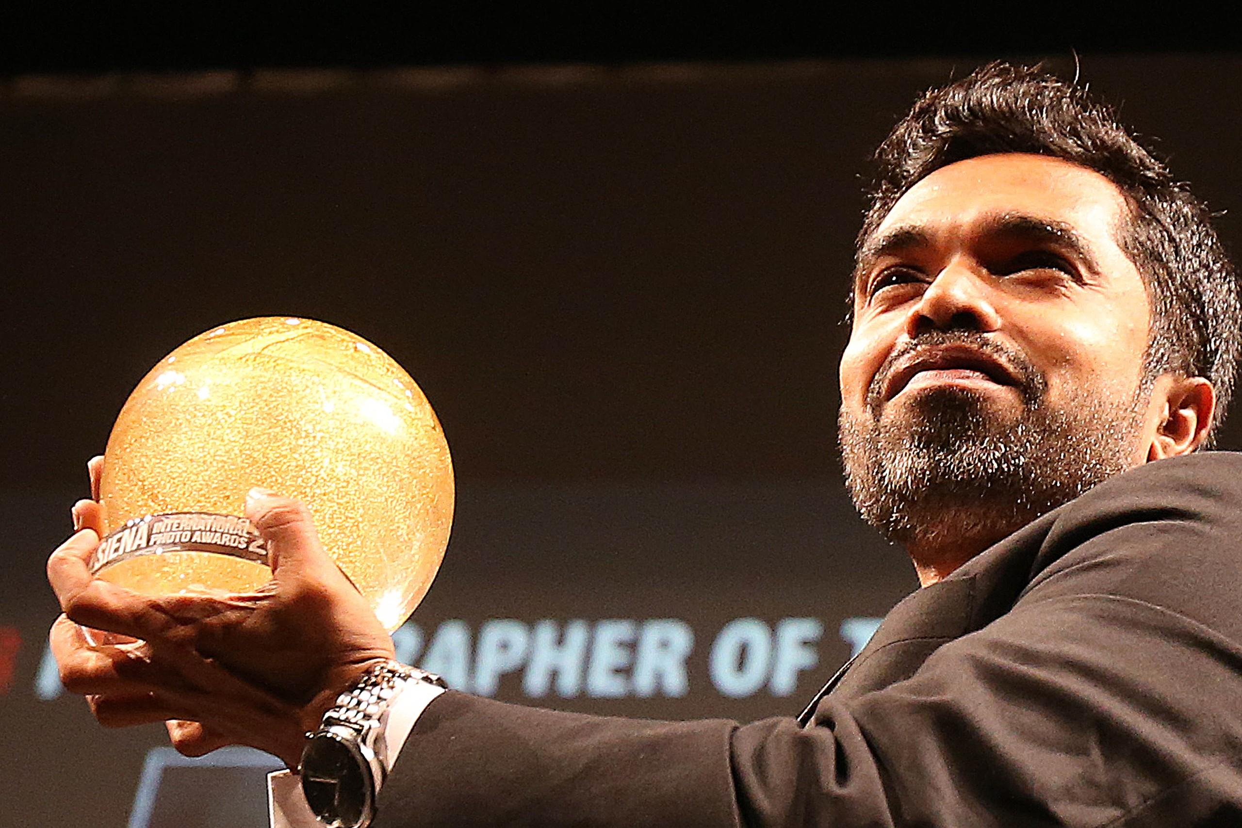 KM Asad, Photographer of the year during the Awards Ceremony at the Teatro dei Rozzi