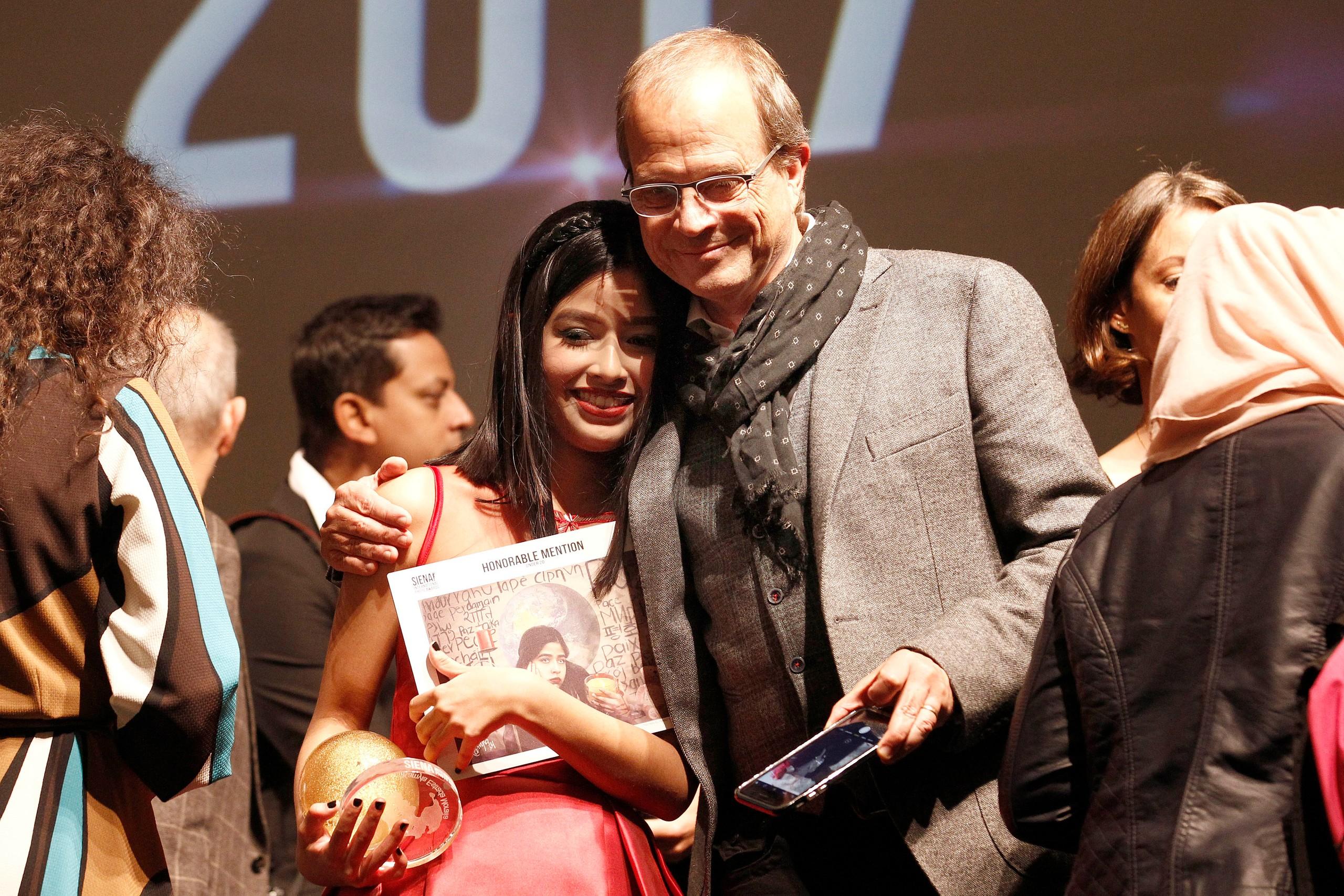 Randy Olson and Kamyla Estrada Moraila during the Awards Ceremony at the Teatro dei Rozzi